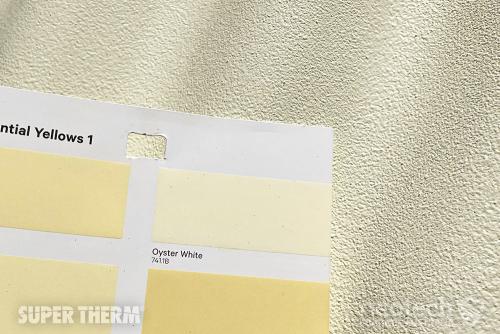 Colour card of Oyster White as an example matched to roof sprayed with Super Therm®.